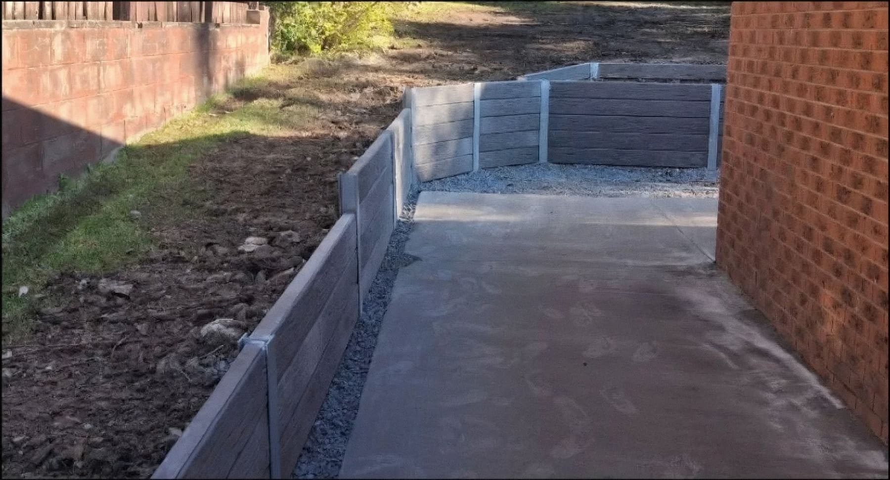 Rebuilt wall at Helensvale