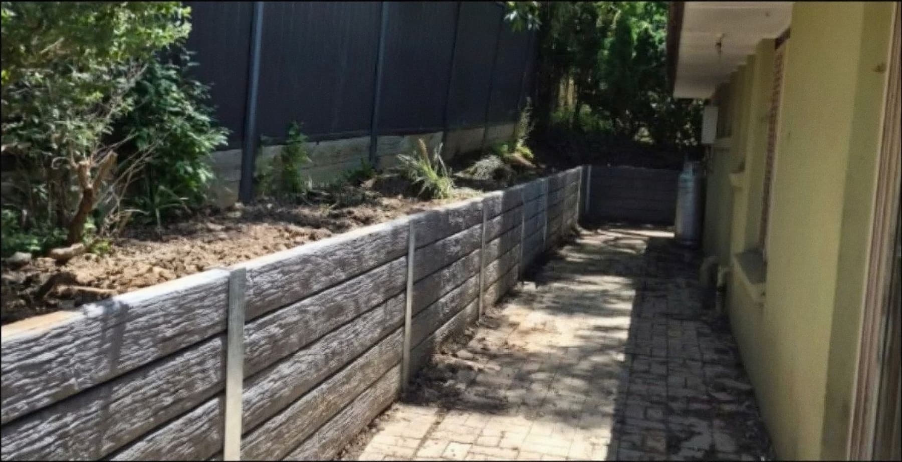Rebuilt side yard at Woodend, Ipswich