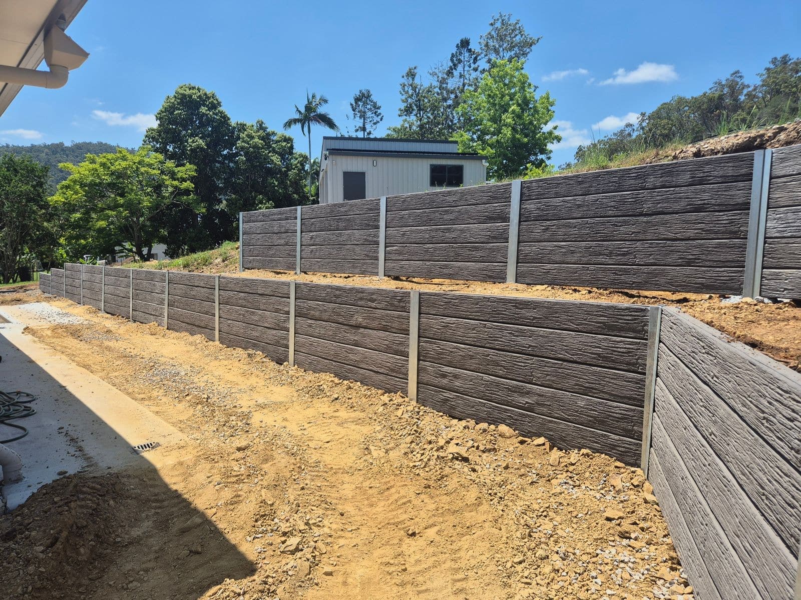 A Heritage Charcoal concrete sleeper retaining wall we built, photo 1
