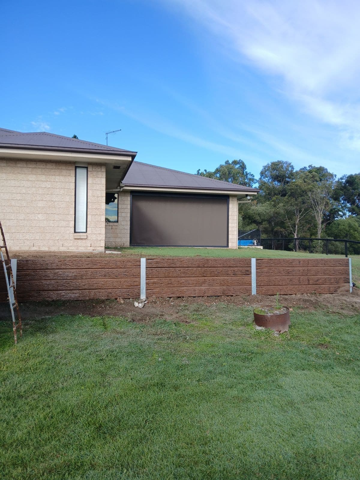 A Stradbroke concrete sleeper retaining wall we built